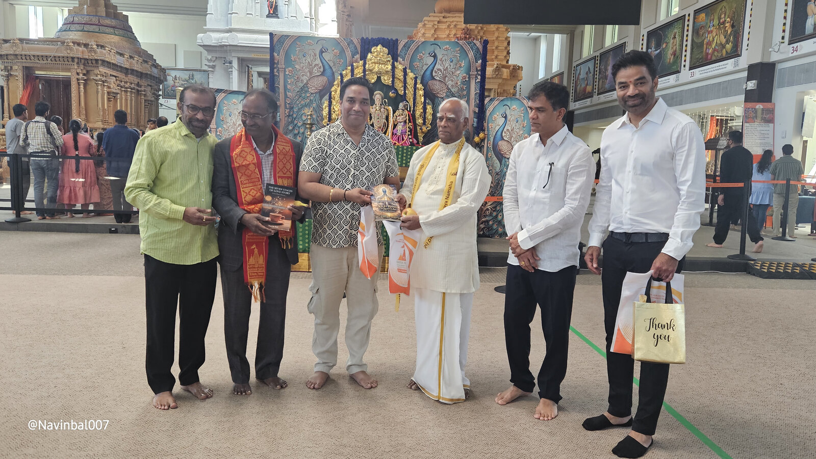 Book presentation with community elders and friends at the temple cultural hall